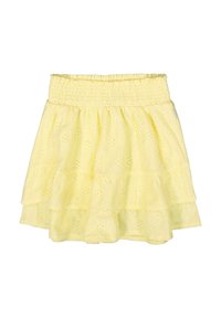 Jupe jaune à plusieurs couches en coton léger avec une taille smockée, présentant un motif ajouré et un ourlet à volants.