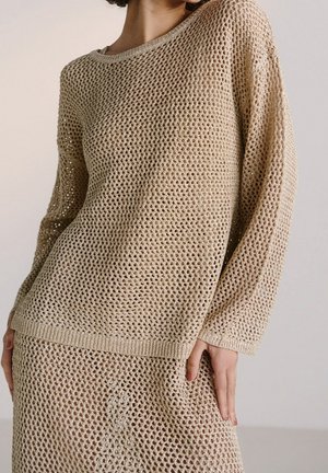 Neule - gold-coloured