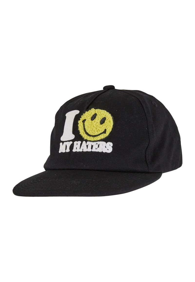 Fekete baseball sapka ívelt karimával, amelyen fehér színű "I ❤️ MY HATERS" felirat található, valamint egy bolyhos sárga mosolygós arc logó. Pamut anyag.