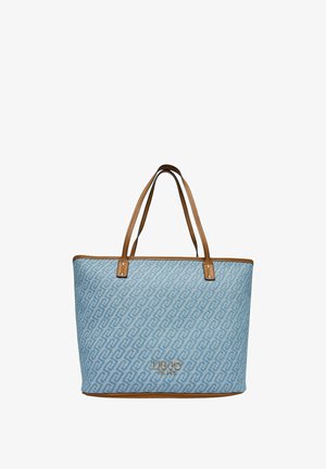 Sac fourre-tout bleu clair avec un motif tourbillonnant, poignées en cuir marron et bordure marron contrastante. Logo sur le devant. Design spacieux.