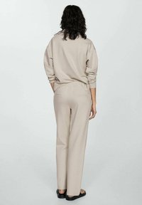 Mango Pantalones deportivos - light grey