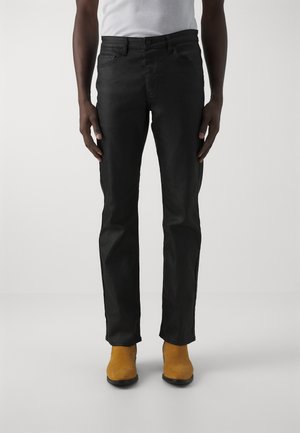 BRONKO - Bootcut jeans - black