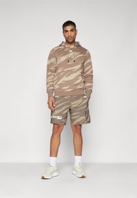 Venum UFC FIGHT WEEK TRAINING SHORTS - Spordišortsid - desert