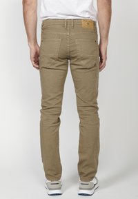 Koroshi STRETCH  - Sirgete säärtega teksad - vison mink light brown