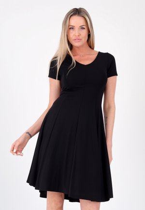 Black short-sleeve dress with a V-neckline, made of soft fabric, featuring a flared skirt that falls just above the knee.