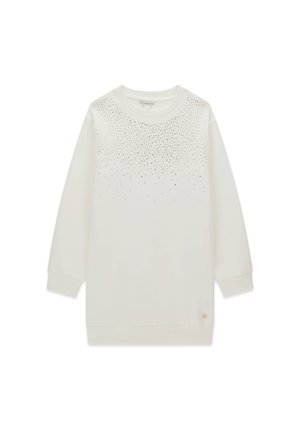Sweat-shirt blanc à manches longues avec petits clous argentés dispersés sur la poitrine et le haut du dos, poignets et bas en côte.