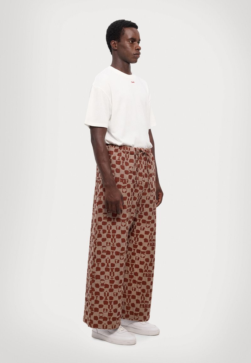 Henrik Vibskov ECLIPSE PANTS UNISEX - Püksid - beige/orange