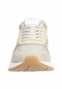 Beige sneaker with a textured suede and mesh upper, featuring gray accents, reflective laces, and a white sole with a rubber tread pattern.