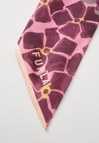 Silk scarf featuring a floral pattern in purple and pink hues, with yellow accents. Corner displays the brand name "Furla."