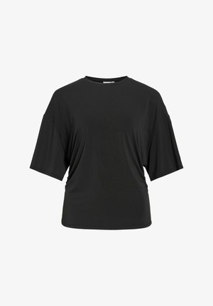 Zwarte oversized T-shirt met korte mouwen, ronde halslijn en een ontspannen pasvorm.