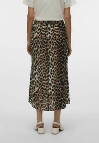 Falda midi de estampado de leopardo con una silueta fluida, hecha de un tejido ligero, que presenta una cinturilla elástica y acentos negros.