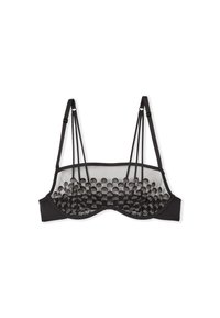 Reggiseno nero con schiena in rete e decorazioni rotonde. Caratterizzato da spalline regolabili e un design strutturato per il supporto.
