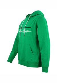 Grön hoodie med en känguruficka, dragsko för huvan och kontrasterande svart och vit textdesign på framsidan. Tillverkad av bomull, avslappnad passform.