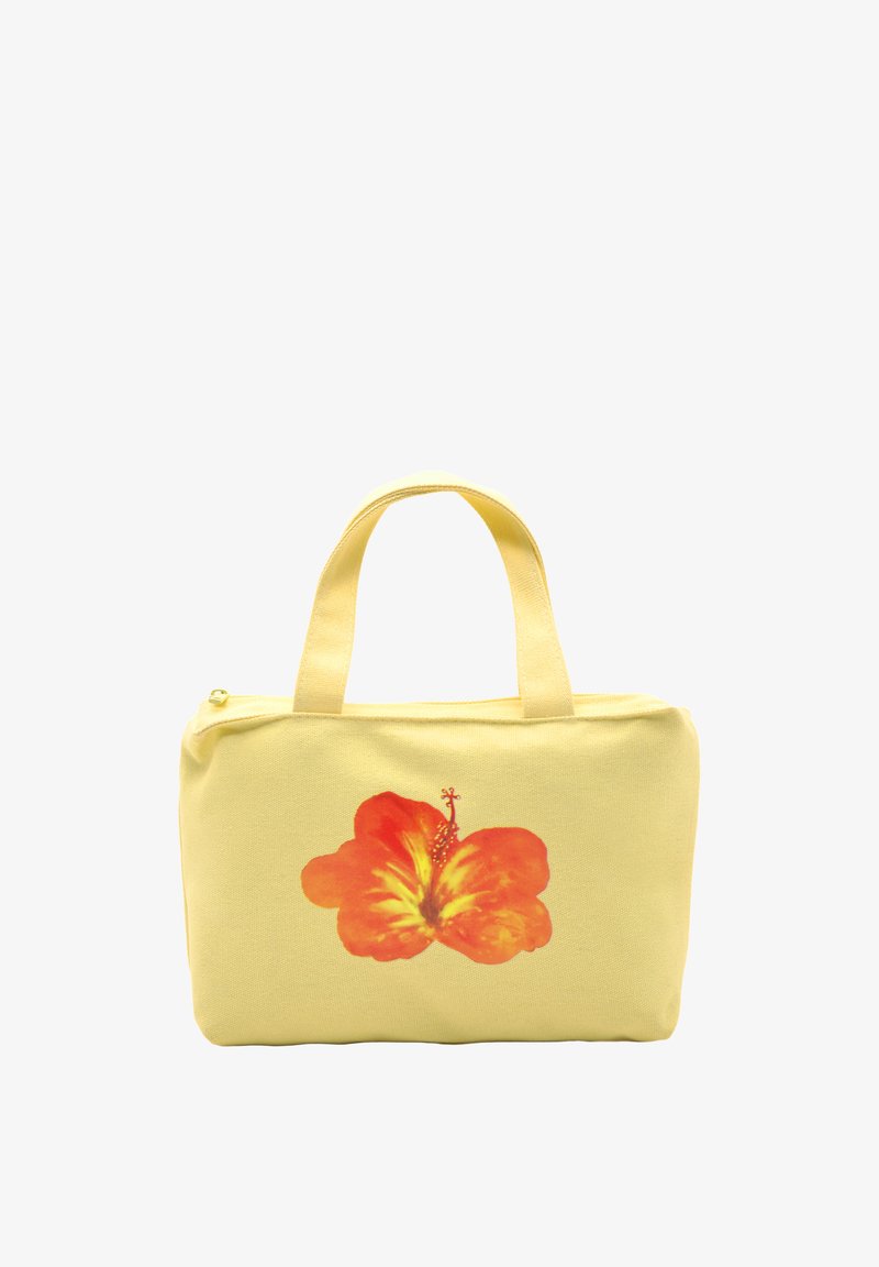 Borsa in tela gialla con stampa di un fiore di ibisco arancione sul davanti, dotata di due manici corti e chiusura con zip sulla parte superiore.
