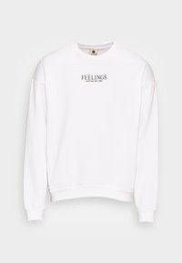 Felpa bianca con maniche lunghe e polsini a coste. Presenta la scritta "FEELINGS" stampata in lettere dorate sul davanti. Design classico con collo a giro.