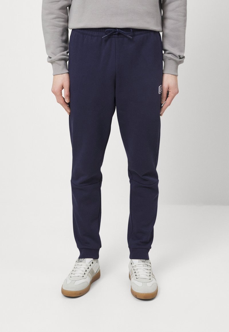 EA7 Emporio Armani TROUSER Tracksuit bottoms dark blue Zalando.co.uk