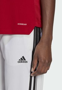 adidas Performance TIRO21 TR JERSEY W - Nyomott mintás póló - team power red