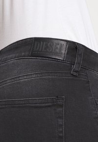 Diesel Vaqueros pitillo - black denim