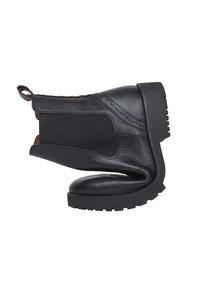 Botte noire en cuir jusqu'à la cheville avec panneau latéral élastique, semelle en caoutchouc épaisse et une languette tissée colorée à l'arrière.