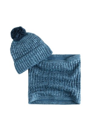 Knitted blue beanie with a pom-pom and matching ribbed neck warmer, both featuring a textured pattern and soft fabric.