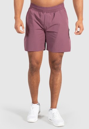 Herren Badehosen in Lila mit einem elastischen Bund, leichtem Stoff und einer seitlichen Tasche für zusätzlichen Komfort. Sanfte Textur, knielang.