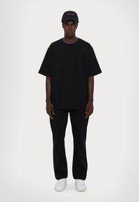 Les Benjamins SWEATPANT UNISEX - Παντελόνι φόρμας - black