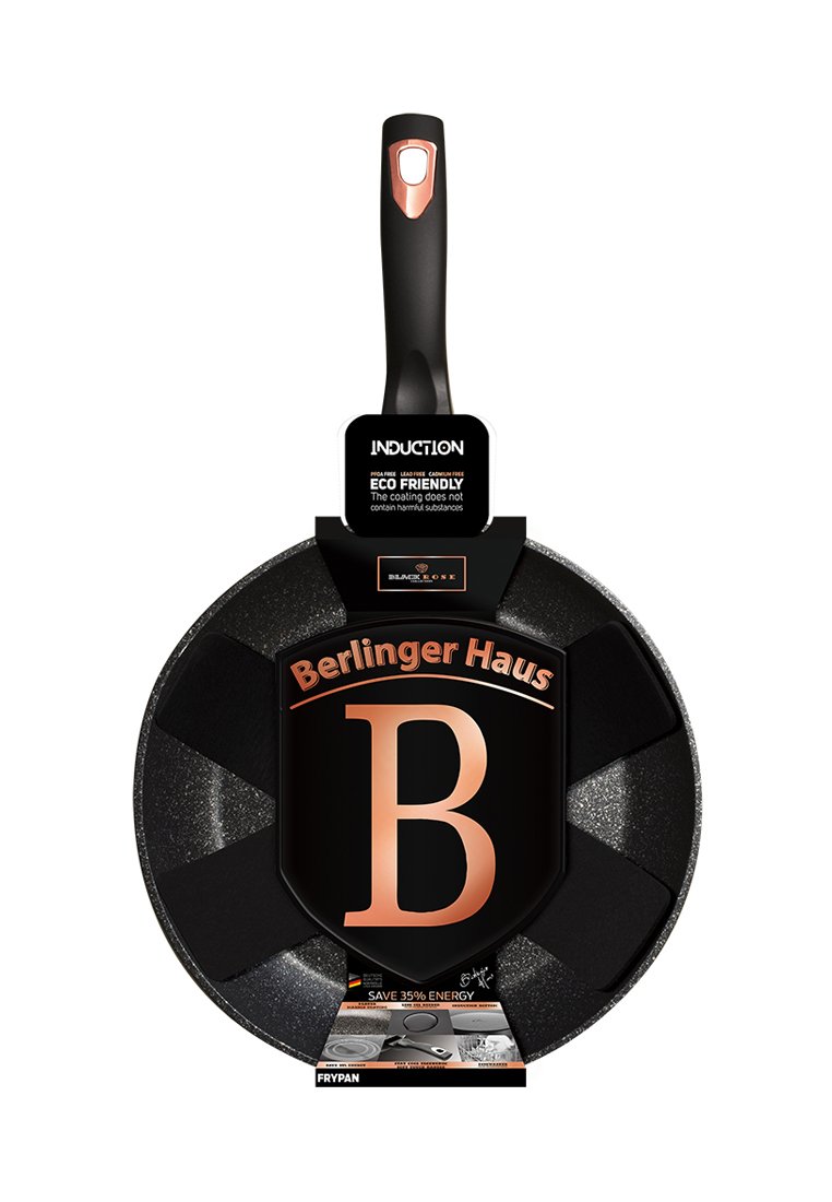 Schwarze Induktionspfanne mit einer Antihaftoberfläche, einem strukturierten Griff und einem Kupferakzent. Die Verpackung zeigt das Markenlogo und ein umweltfreundliches Etikett.