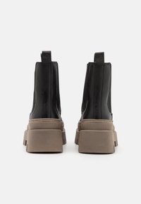Tamaris Botines con plataforma - black