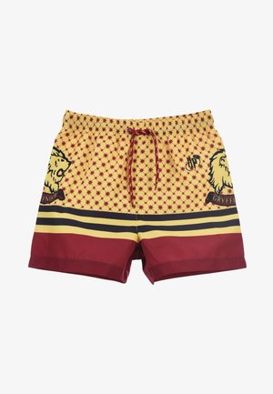 Rote und gelbe Badeshorts mit einem Karomuster, ausgestattet mit einem Löwenemblem und Gryffindor-Text, elastischem Bund und Kordelzug.