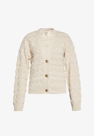 Crème kleurige cardigan met een gestructureerd breipatroon, voorzien van een V-hals, lange mouwen en vier knopen. Ribgebreide manchetten en zoom zorgen voor extra detail.