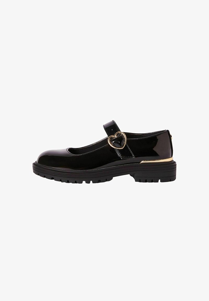 Chaussure Mary Jane en cuir verni noir avec semelle épaisse, boucle dorée en forme de cœur sur la bride et bord doré au talon.