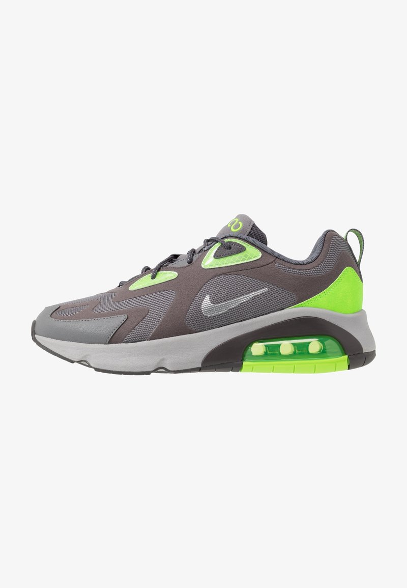 Baskets Nike Air Max grises et vert néon avec amorti d'air visible dans la semelle, empeigne en mesh et synthétique, et fermeture à lacets.