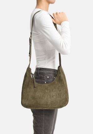 Olive green suede shoulder bag with a textured crocodile pattern, featuring a zip closure and a long, adjustable strap.