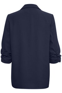 Navy blue blazer with a structured collar, long puff sleeves, and gathered detailing at the cuffs. Smooth fabric with a polished finish.
