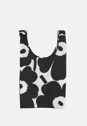 Saco de flores preto e branco com decote arredondado. Feito de tecido leve, apresenta grandes padrões florais e formas abstratas.