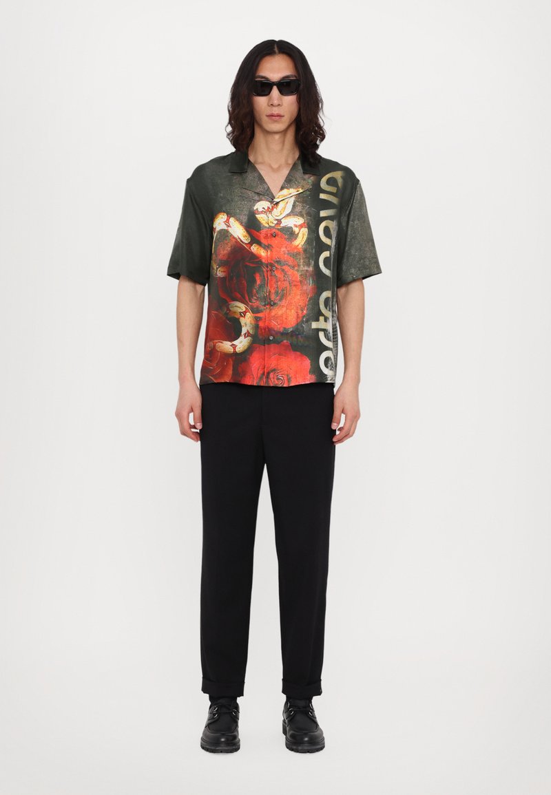Chemise Roberto Cavalli Noire - Neuve Avec étiquettes - Fabrication Italie - Modèle PNT7324QF03
