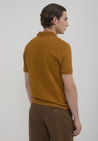 Calliope Poloshirt - jaune