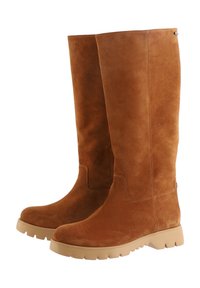 Brown suede knee-high boots with a rounded toe, textured surface, and a durable tan rubber sole featuring tread for grip.