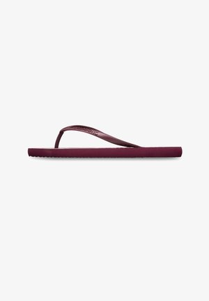 Tongs de couleur violet foncé avec une bride en forme de lanière et une semelle texturée, vues de profil sur un fond blanc.