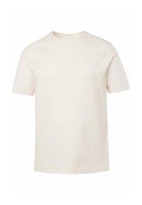 Camiseta de algodón color beige claro con mangas raglán cortas, cuello redondo, corte recto y sutiles detalles de costura a lo largo de las costuras.