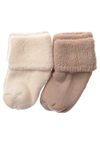 Zwei Paar Säuglingssocken: eine in Creme und eine in hellbraun. Beide verfügen über einen strukturierten, gerippten Bündchen und einen weichen, glatten Körper.