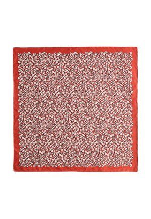 Red square scarf with dense white floral pattern and solid red border.