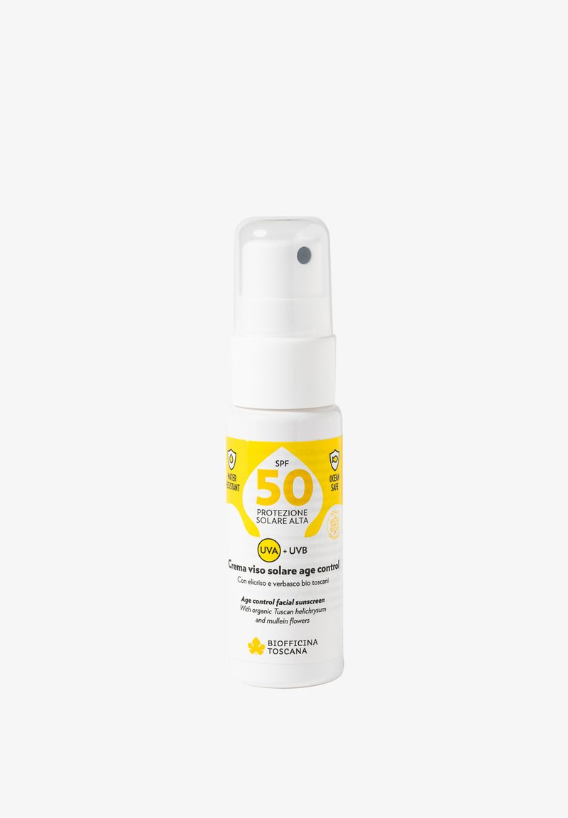 Flacone di crema solare con finitura opaca bianca. Presenta un tappo trasparente, accentuazioni gialle, etichetta SPF 50 e testo in italiano e inglese.