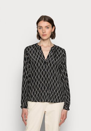Schwarze Bluse mit langen Ärmeln, V-Ausschnitt und einem weißen, perlenartigen Muster. Hergestellt aus einem glatten Material mit gerafften Manschetten und einer lockeren Passform.