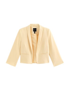 Blazer cropped para mujer de color crema con mangas largas, cuello con solapa tipo muesca y dos bolsillos frontales con abertura, presentado sobre un fondo blanco.