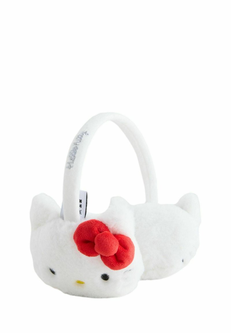 White plush slippers featuring a cat design, red flower accent, round shape, and black eyes. Soft texture and sturdy handle for easy carrying.