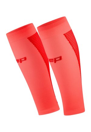 Pair of bright coral compression calf sleeves with textured panels and subtle logo on a white background.