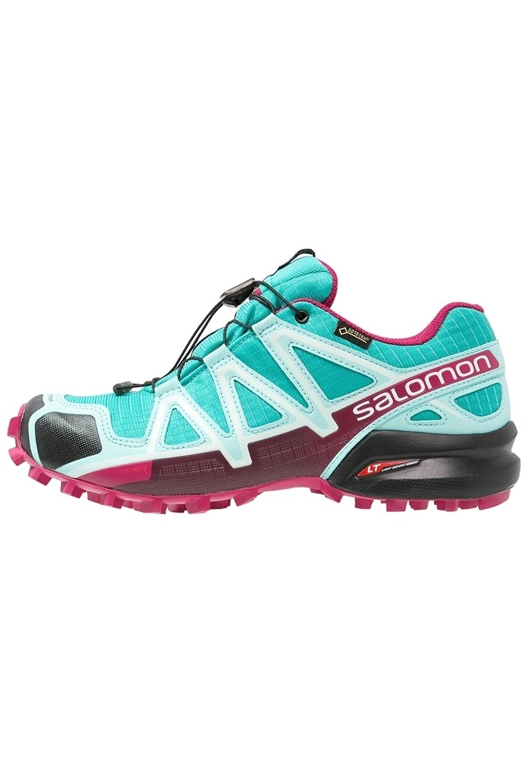 Trailrunning-Schuh mit einem türkisfarbenen Mesh-Obermaterial, pinken Akzenten, schwarzem Zehenschutz und einer strukturierten Sohle. Verfügt über ein Schnellschnürsystem für einen sicheren Sitz.