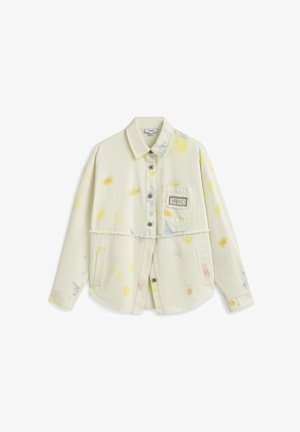 Beige langarmig overhemd met knopen, voorzien van abstracte gele en blauwe vlekken, een borstzak aan de voorkant met het label "MERCI" en een rafelige zoom aan de taille.