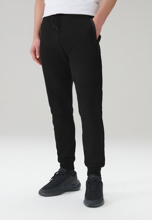 Next REGULAR FIT - ATHLEISURE CUFFED JOGGERS . - Træningsbukser - black